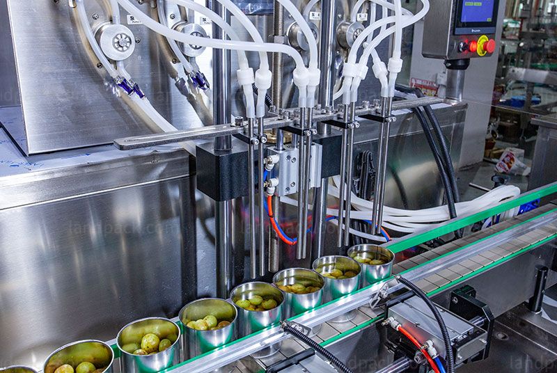 Pickle and condiment canning and filling line